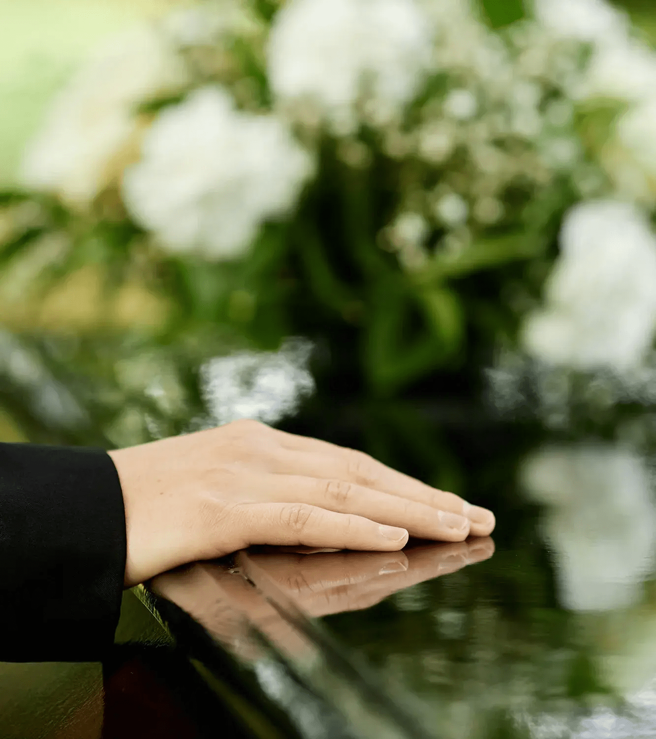 close-up-female-hand-coffin-saying-goodbye-outdoor-funeral-ceremony-copy-space